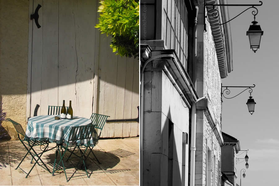 Wine bottles sit atop a cafe table in France's Burgundy region.