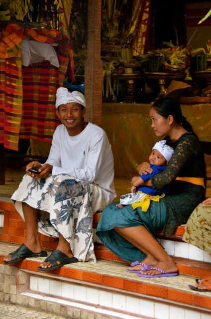 Couple with baby in Balinese Ceremony