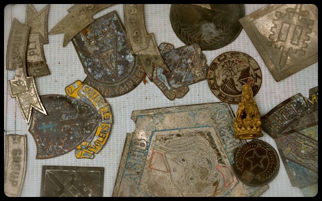 War Items for Sale in Hue, Vietnam war medals and dog tags for sale on Vietnamese sidewalk