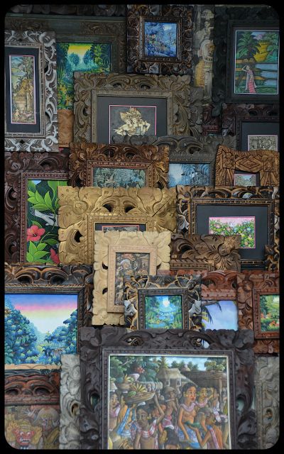 Balinese framed paintings on display and for sale.