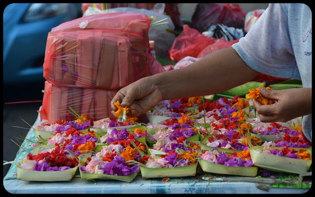 Flower offerings canang sari in Bali market