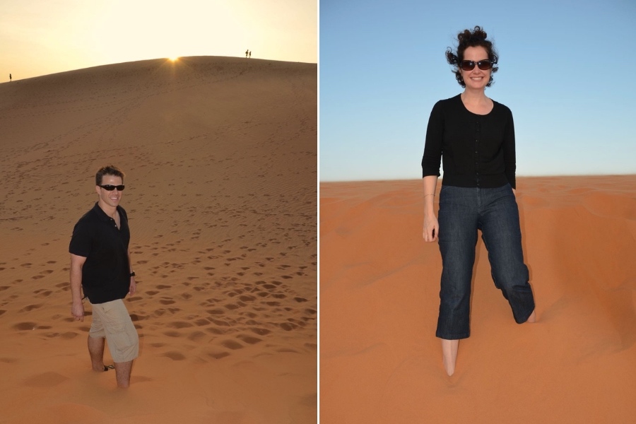 People standing in sand at the Mui Ne Red Sand Dunes