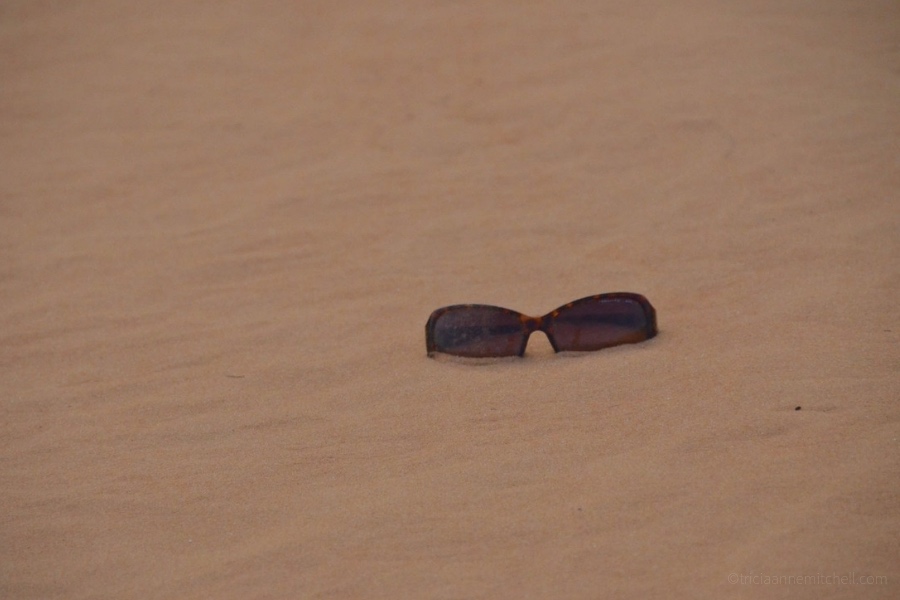 A pair of sunglasses at the Mui Ne Sand Dunes.