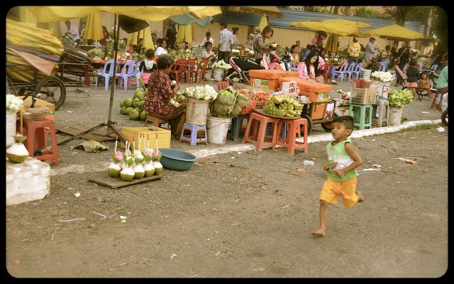 Making Offerings at Phnom Penh Riverside