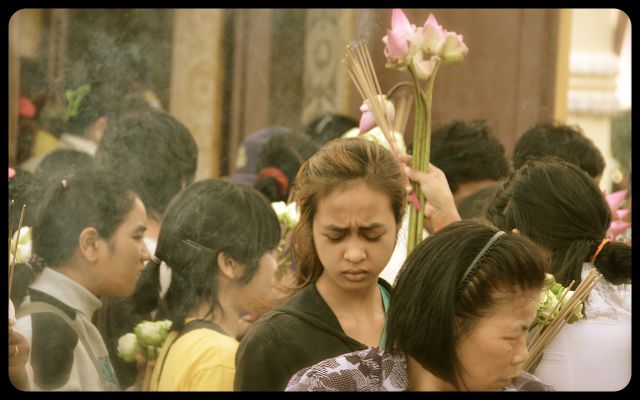 Buddhist Prayer at Phnom Penh Riverside
