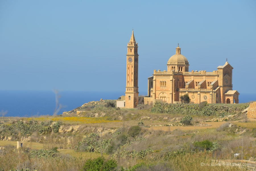 The Ta' Pinu Basilica towers over the landscape of the Maltese island of Gozo.