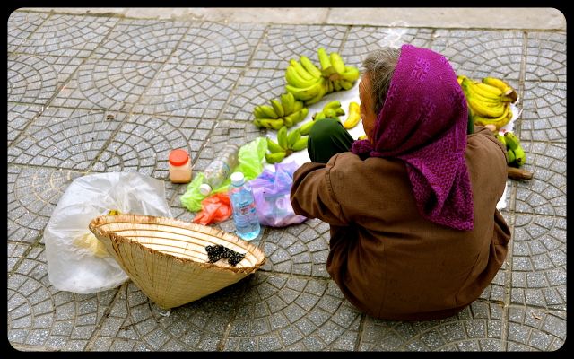 woman selling bananas in Hoi An Vietnam woman selling bananas in Hoi An Vietnam