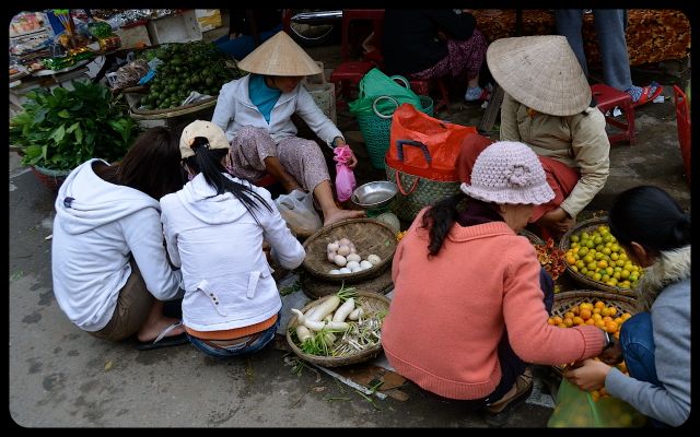 Ladies at Hoi An Marketplace Ladies at Hoi An Marketplace