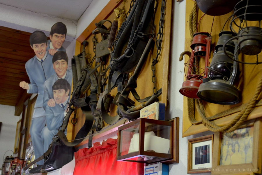 Beatles insignia, harnesses and lamps hang on the walls of the Mr. Maestas Mexican-American restaurant, Holbrook, Arizona
