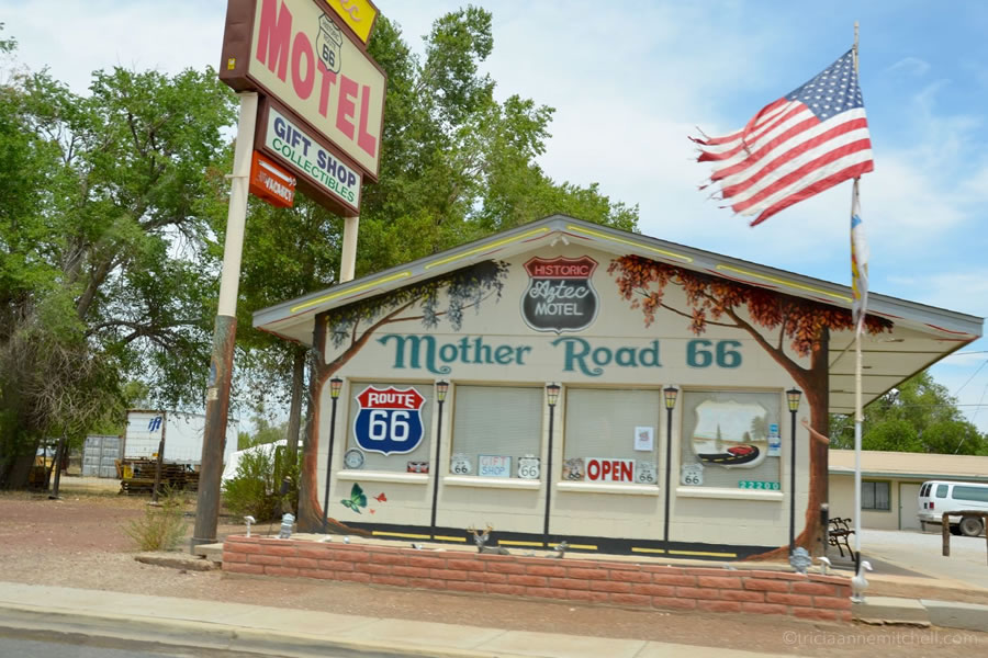 An American flag flies in front of the Aztec Motel, along Route 66 in Seligman Arizona.