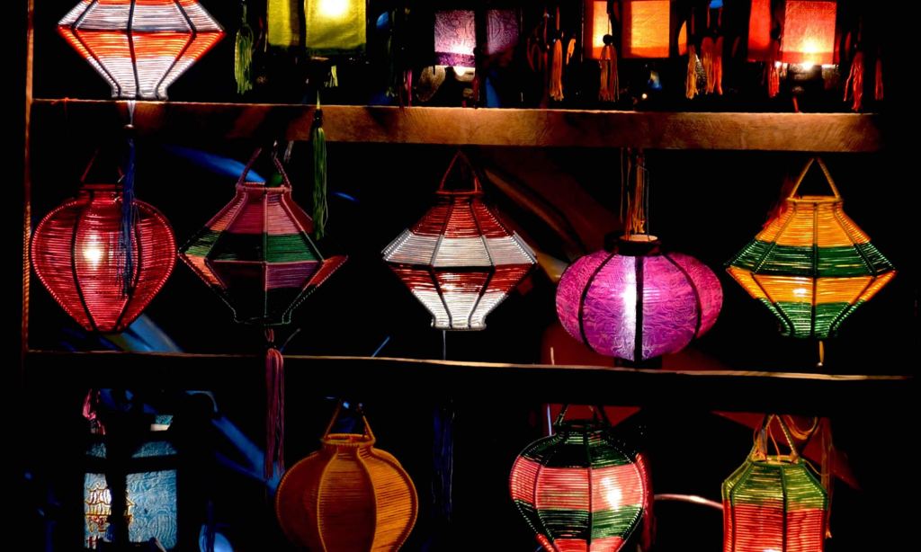 Colorful beaded lanterns hang outside a lantern shop in Hoi An, Vietnam.