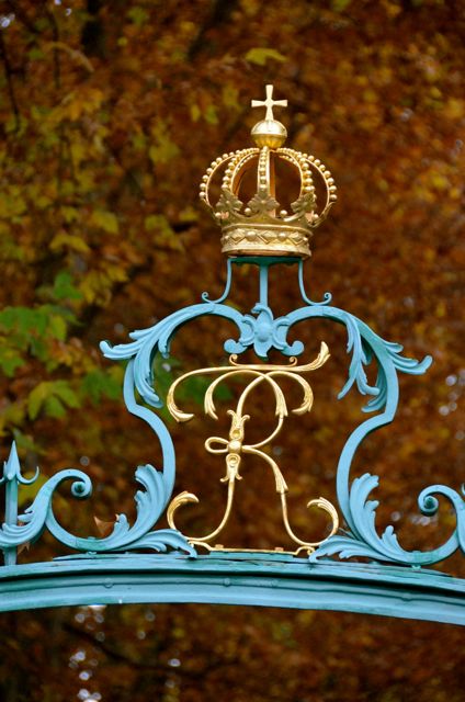 Regal blue and gold gate ornamentation at the Ludwigsburg Palace during the annual Pumpkin Fest.