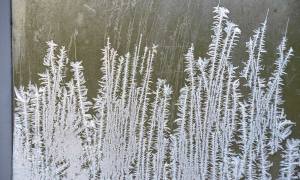 Frost adorns a window in the German village of Oberammergau.