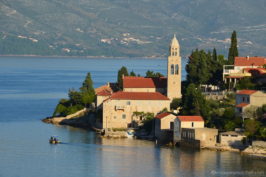A church and its belltower, situated on Croatia's Adriatic Coast, on the island of Korcula.