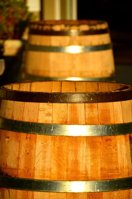 Two wooden wine barrels soak up the early-evening sunshine in California.