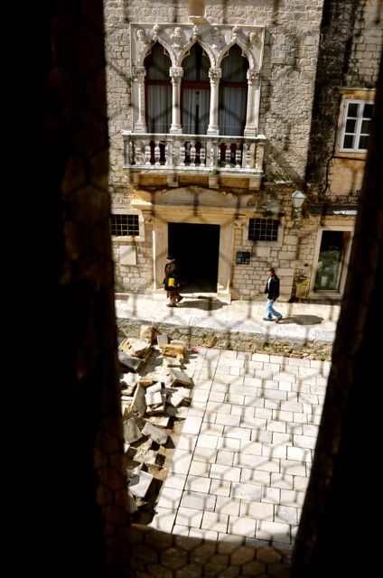 view from trogir belltower onto street