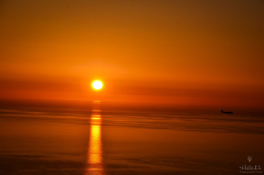 An airplane makes its descent at the Santorini Airport.