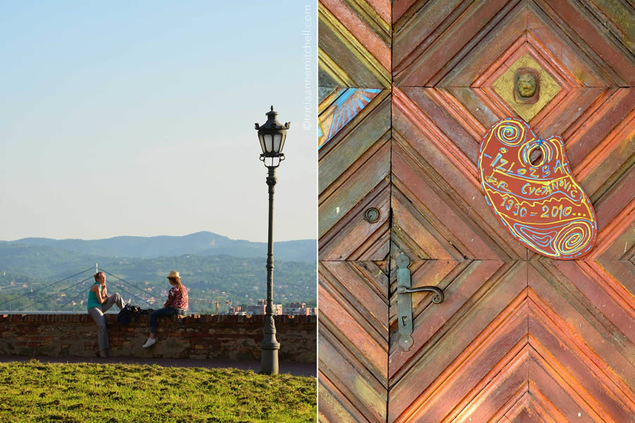 Two women sit on a wall of the Petrovaradin Fortress (left). On right, the ornamental door of an art gallery inside the Petrovaradin complex.