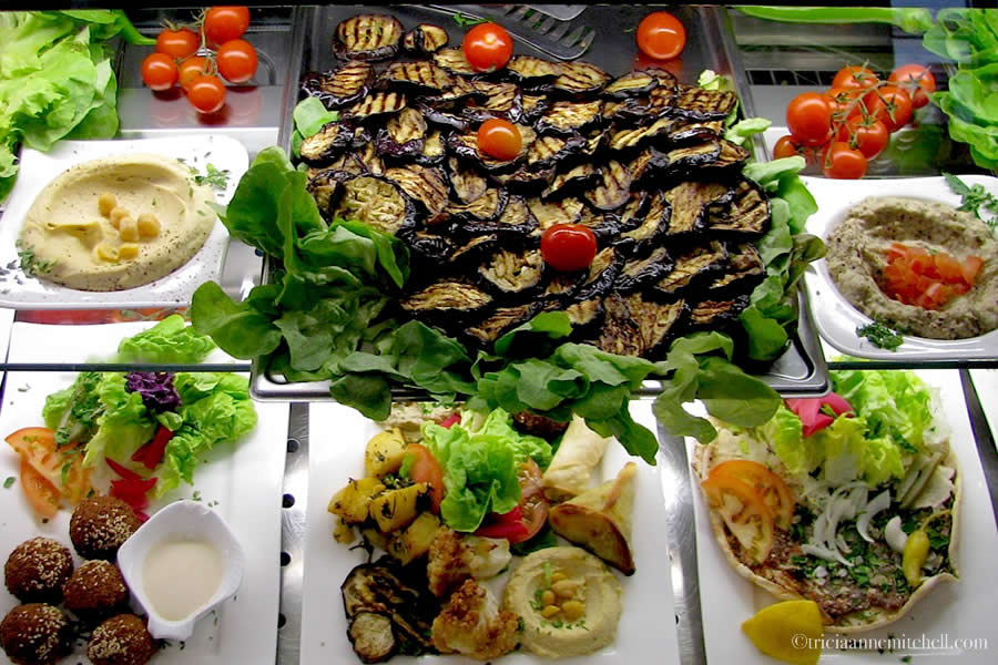 Sahara restaurant display window in Heidelberg, Germany features Falafel, Shwarma, Hummous