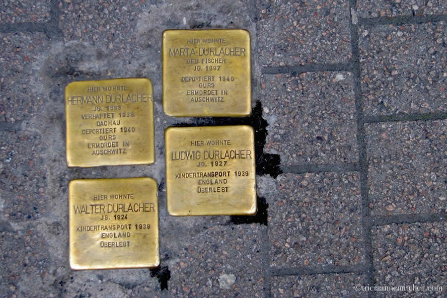 Four brass Stolpersteine (Holocaust memorials), which literally translate to "stumbling blocks," are embedded in the pavement of Heidelberg's Hauptstrasse.