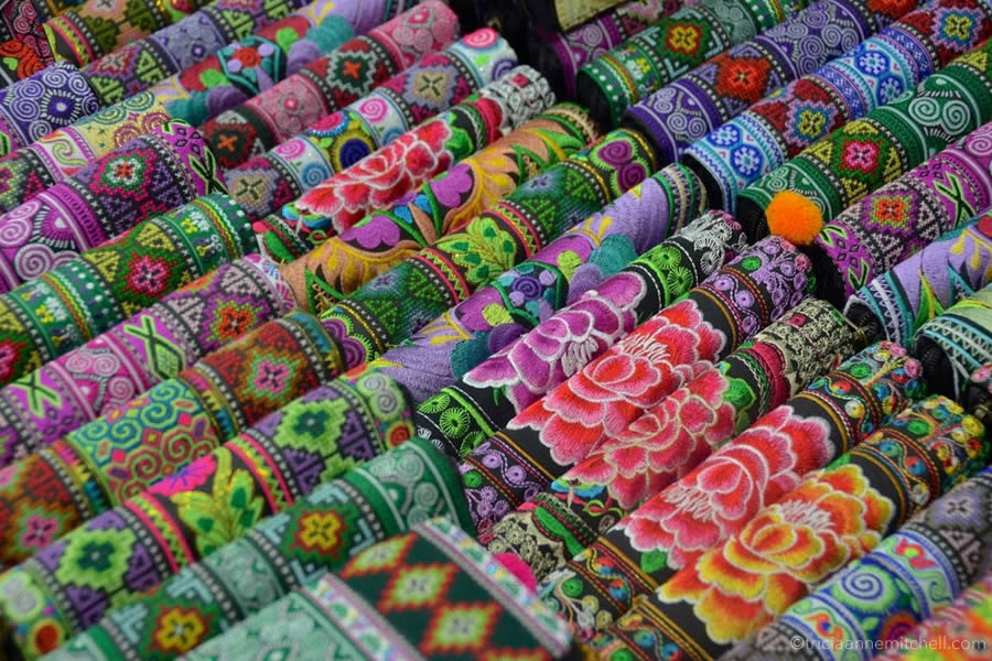 Colorful wallets and purses for sale at a market in Chiang Mai, Thailand.