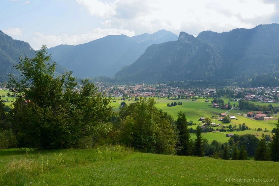 The town of Oberammergau, Germany is visible from a neighboring hill. You can see Oberammergau's