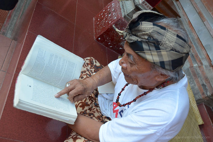 Ketut Liyer and Eat Pray Love Book Ketut Liyer points to his name on the page of the book, Eat, Pray, Love.