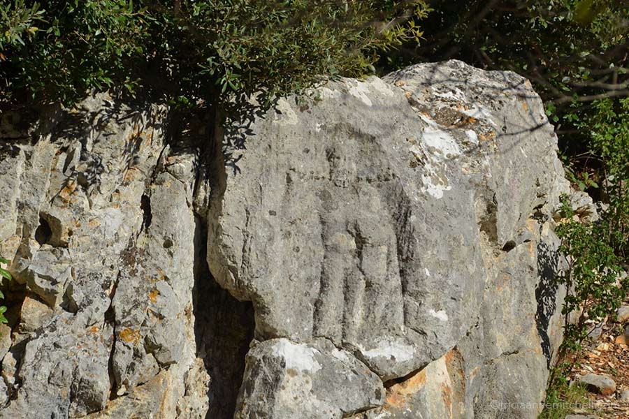 A weathered relief depicting Hercules inside a former quarry on the Croatian island of Brac.