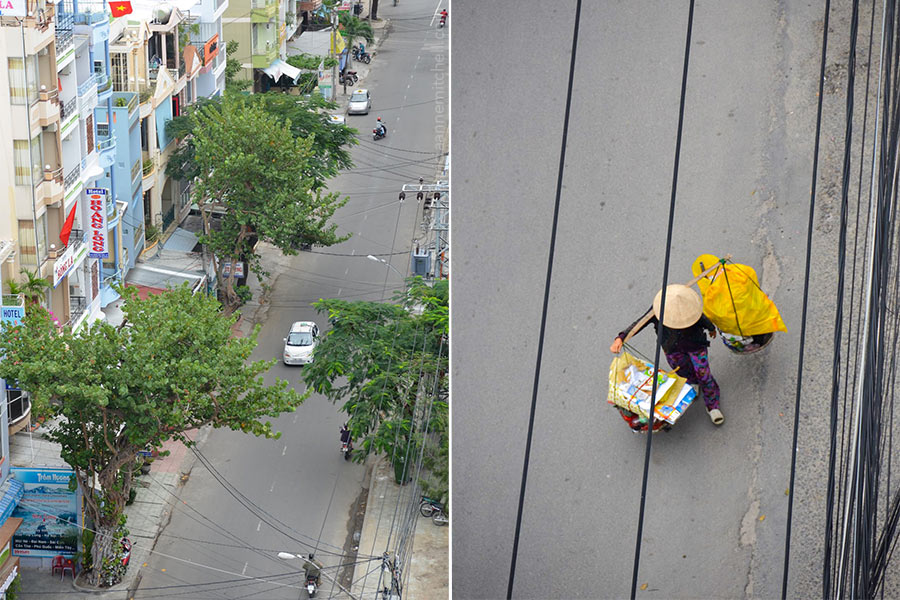 A Vietnamese vendor and motorcyclist proceed down a Nha Trang street.