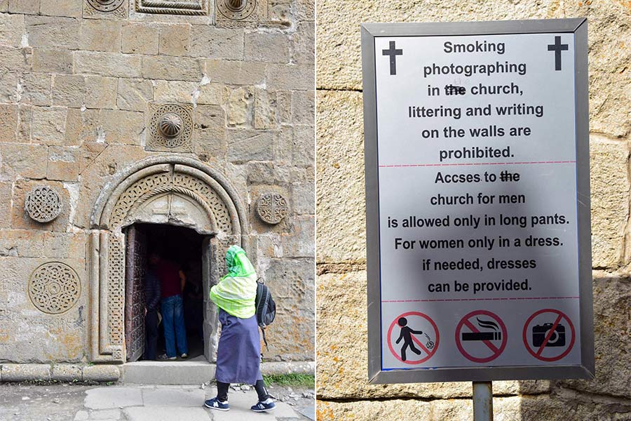 In the photo on the left, a woman wearing a green headscarf walks past a doorway of the Gergeti Trinity Church in Georgia. On the right, a sign outside the church reads: "Smoking, photography, littering and writing on the walls are prohibited. Access to the church for men is allowed only in long pants. For women only in a dress. If needed, dresses can be provided. There are also symbols showing that littering, smoking, and photography are not allowed.