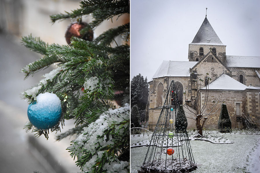 On the left, snow clings to a blue and copper-called ornament on an evergreen tree. On the right, the Saint Denis Church in Amboise, France is dusted with a light snowfall.