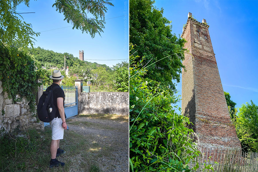 From afar, a man looks at the Pile de Cinq Mars, a brick Gallo-Roman tower.