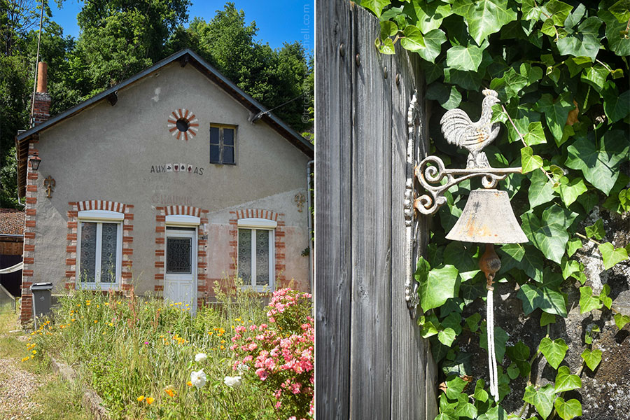 On the left, symbols found on a deck of cards decorate the facade of a French cottage. Right: A bell topped with a rooster hangs on a wooden door in the French town of Cinq Mars la Pile. Green ivy surrounds the bell.